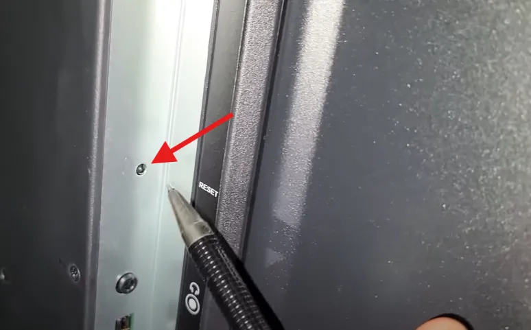 Back of TV showing reset button.