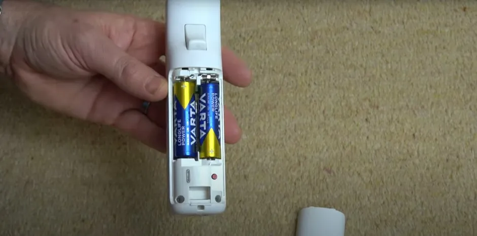 Wii remote battery compartment